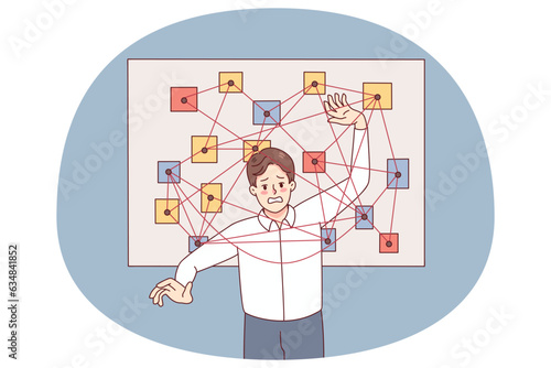 Unhappy man feel stressed with overwhelming work tasks and issues. Confused male employee frustrated with schedule and plans. Time management concept. Vector illustration.