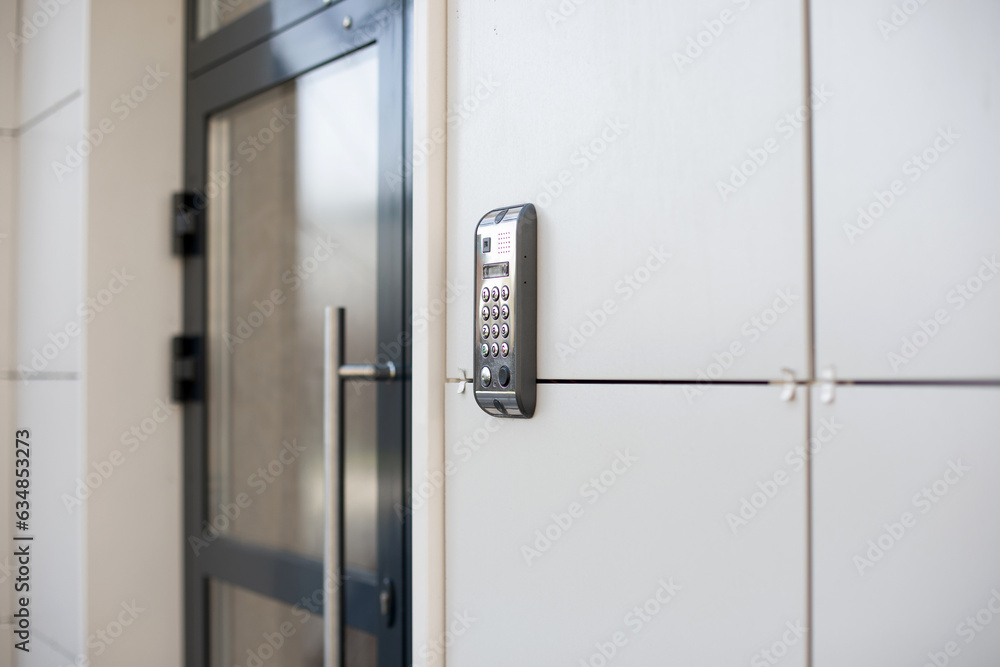 Doorphone with code near the door, entrance at the house Doorphone with code near the door, entrance at the house