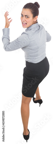 Digital png photo of angry hispanic businesswoman standing on transparent background