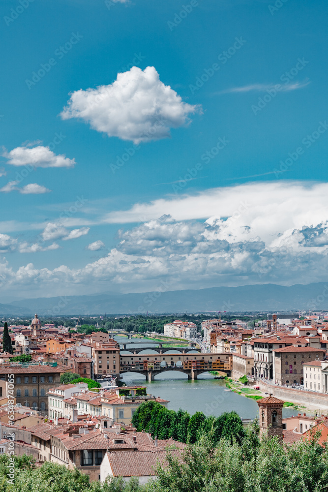 Cityscape with Ponte Vecchio over Arno River and buildings