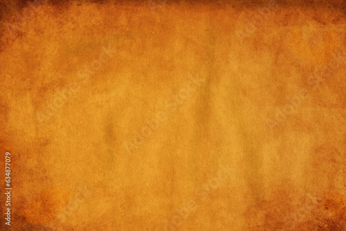 Textured background of parchment, paper, antique paper. Warm and strong color