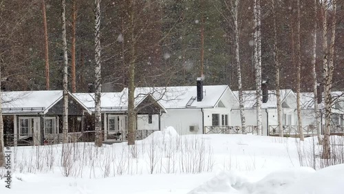 Winter landscape, snowing over the houses. Sweden, Lulea. Idyllic Winter Landscape photo