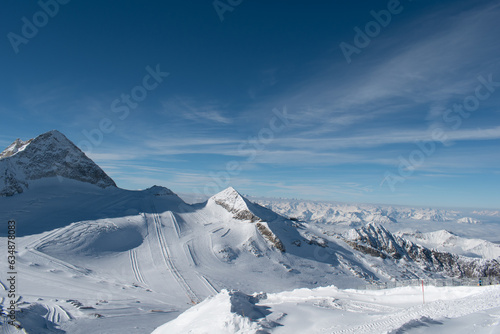Hintertux glacier panorama on a sunny winter day. Snowy background panorama, white winter scenery. © Eyo