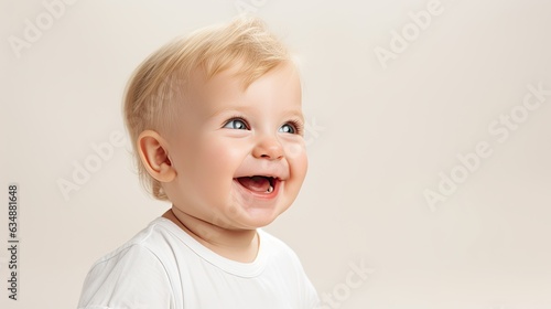 a horizontal layout of a blonde infant boy model looking up 3/4 view with subtle background and space for copy for mock-ups / product display in a Commercial-themed JPG format. generative ai