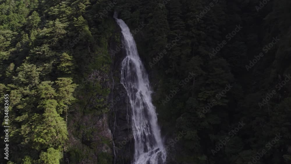 Huge waterfall in the mountains and river in Odaicho, Mie Japan by drone Huge waterfall in the mountains and river in Odaicho, Mie Japan by drone