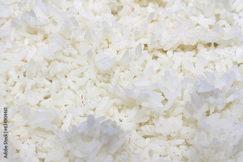 white rice background. white rice texture. close up of rice. rice with selective focus.