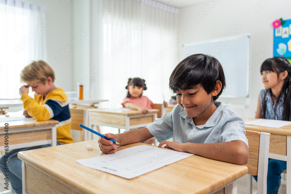 Group of student learn with teacher in classroom at elementary school. Group of student learn with teacher in classroom at elementary school.