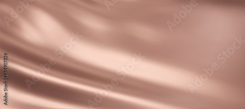 Close-up texture of  nude color silk. Warm nude fabric smooth texture surface background. Smooth elegant beige silk in Sepia toned. Texture, background, pattern, template.