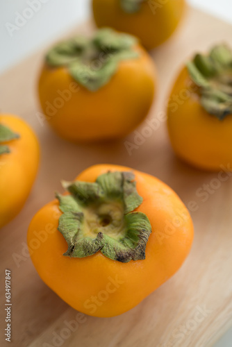Fresh persimmon fruit in autumn season