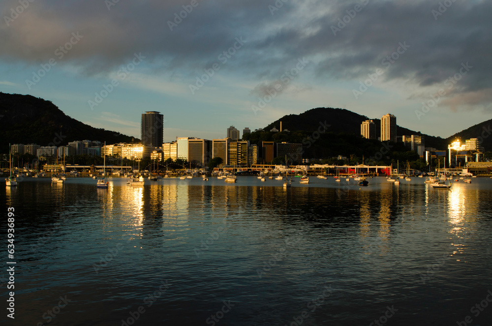 Skyline of Botafogo District Reflected on Water During Sunrise in Rio de Janeiro City