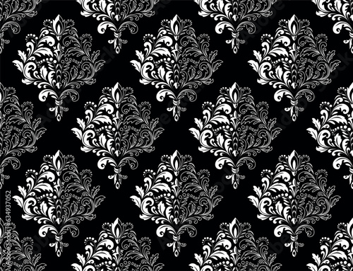 Wallpaper in the style of Baroque. Seamless vector background. White and black floral ornament. Graphic pattern for fabric, wallpaper, packaging. Ornate Damask flower ornament
