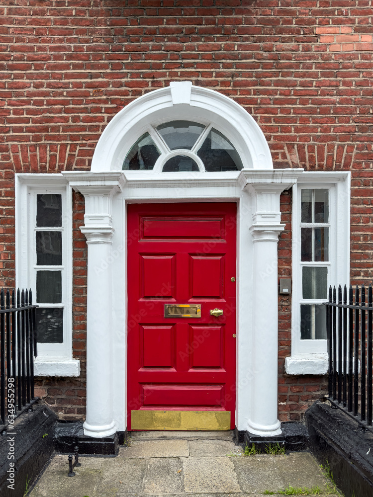 Naklejka premium A famous red painted Georgian door in Dublin, Ireland