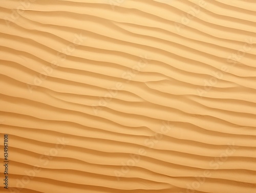 The background is abstract. Sandy, wavy, beige, wavy line pattern, seashore, sandy surface.