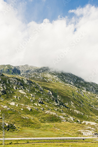 landscapes high in the mountains, mountain peaks, fog, meadow, sun in the mountains, alpine trails, mountain walk