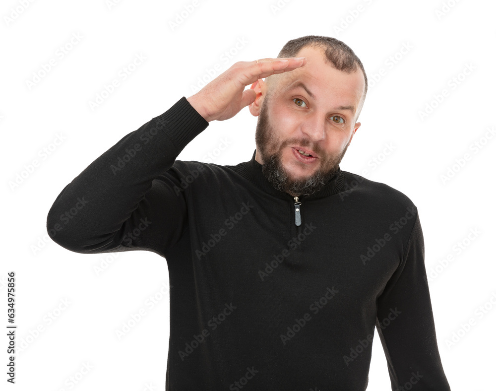 Portrait of concerned thirty year old man saluting with grimace on her face, isolated on white background. Bearded caucasian man in black turtleneck posing in studio. Portrait of concerned thirty year old man saluting with grimace on her face, isolated on white background. Bearded caucasian man in black turtleneck posing in studio.