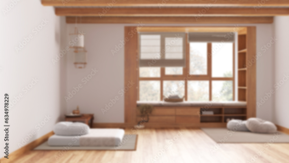 Blurred background, japandi meditation room, pillows, tatami mats and sitting window. Wooden beams and parquet floor. Minimalist interior design