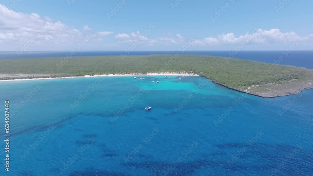 Incredible turquoise and blue ocean water of Catalina tropical island beach in Dominican Republic, aerial drone view Incredible turquoise and blue ocean water of Catalina tropical island beach in Dominican Republic, aerial drone view