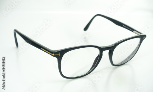 black frame glasses on white background