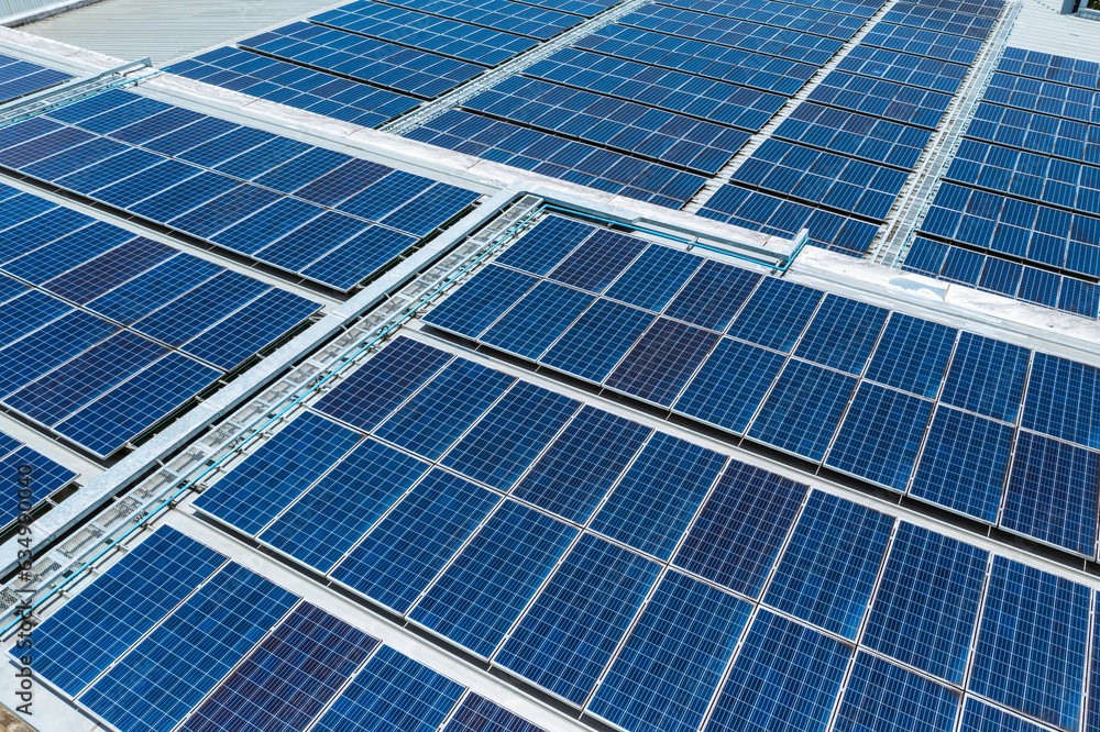 Solar panels background from aerial view on roof of department store. Solar panels background from aerial view on roof of department store.