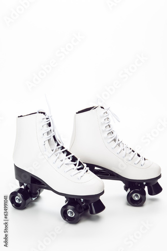 Sport Ideas. Pair of White Stylish Roller Skates on White Background.