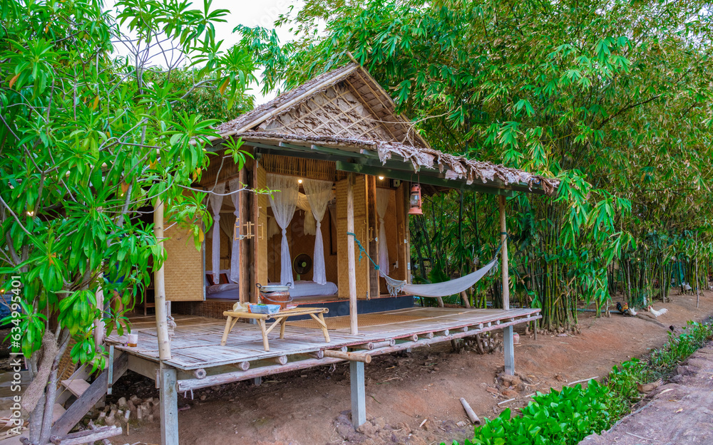 Bamboo hut homestay farm with Green rice paddy fields in Central Thailand Suphanburi region, Bamboo hut homestay farm with Green rice paddy fields in Central Thailand Suphanburi region,