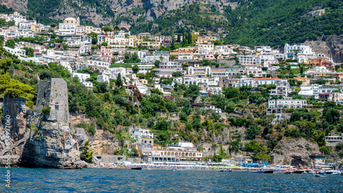 Ancient tower and Fornillo beach in Positano seen from the sea. Amalfi Coast, Italy.
