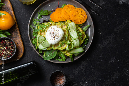 Zucchini waffles with poached egg