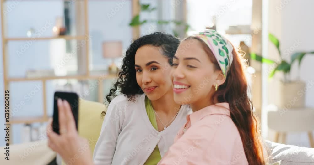 Women friends, selfie and smile on sofa, excited or together for social media, blog or post on web. Girl partnership, content creator and smartphone for memory, photography or profile picture in home Women friends, selfie and smile on sofa, excited or together for social media, blog or post on web. Girl partnership, content creator and smartphone for memory, photography or profile picture in home