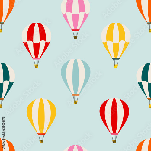 Bright seamless pattern with hot air balloons. Hand drawn balloon in the sky. Cute baby background. Funny decor for nursery, textiles, clothing, packaging, interior.