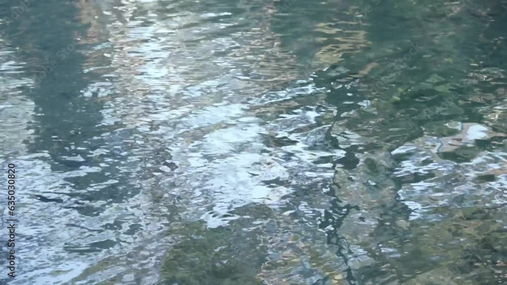 water ripples formed from the flow of the river. Can be used for B-roll water ripples formed from the flow of the river. Can be used for B-roll