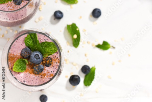 Smoothie and blueberries flat lay