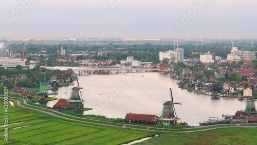 Dutch windmills at the famous touristic place named Zaanse Schans, the Netherlands photo