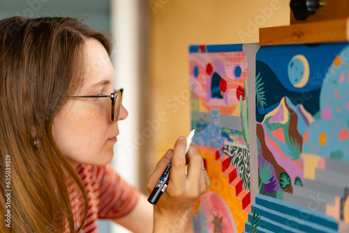 Artist woman with a painting