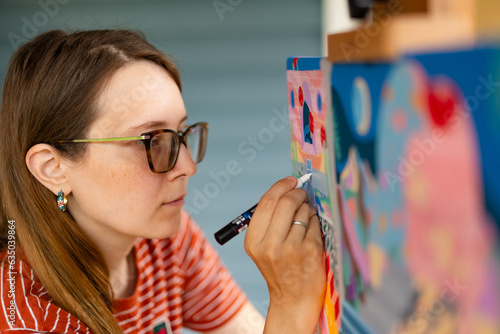 Artist woman with a painting