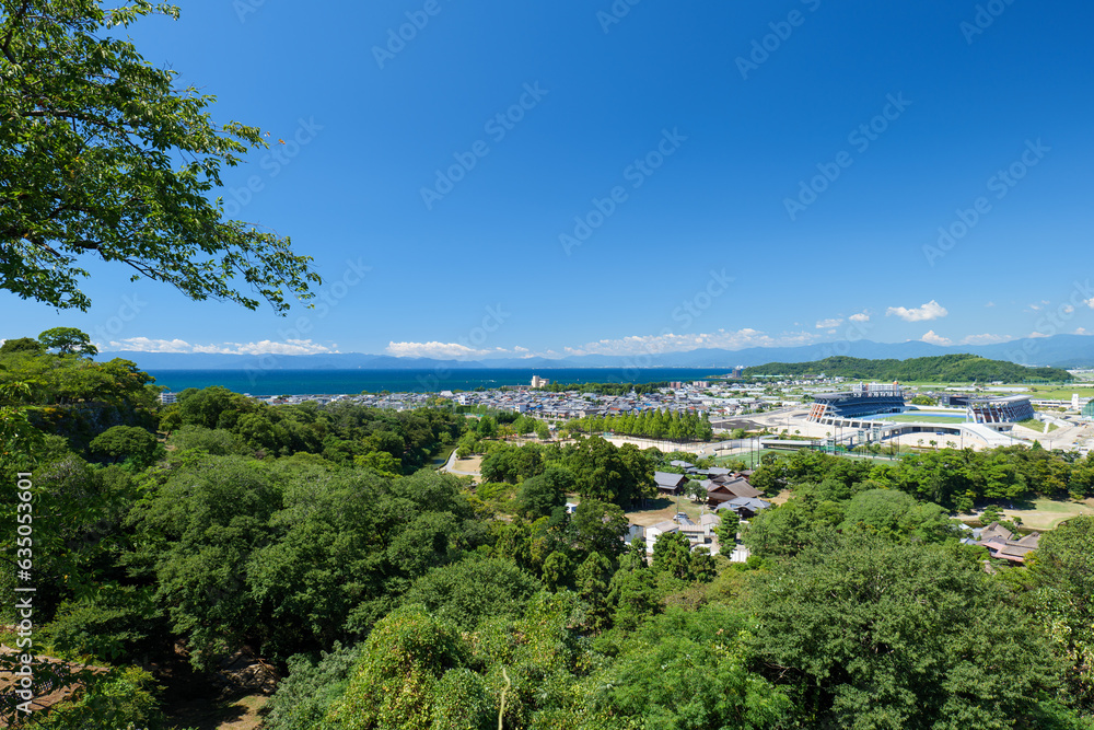 夏の彦根城からの眺め　平和堂HATOスタジアム方面　滋賀県彦根市