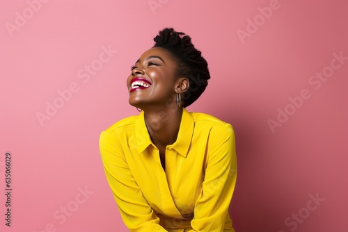 Joyful Laughter of African Woman On a Pink Backdrop © Nld