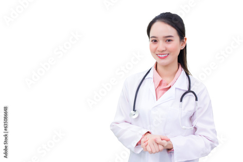 Young professional Asian woman doctor in medical uniform is standing smiling confidently holding hands while working isolated on white background. healthcare concept