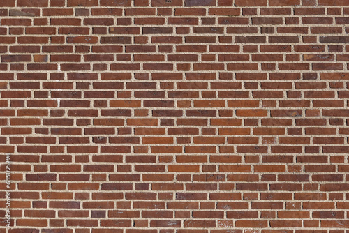 Background of rough brick wall surface with Flemish bond pattern. 