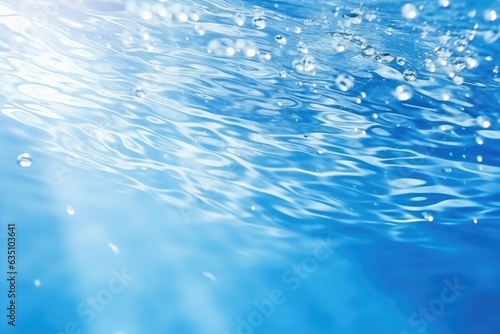 De-focused blurred transparent blue colored clear water