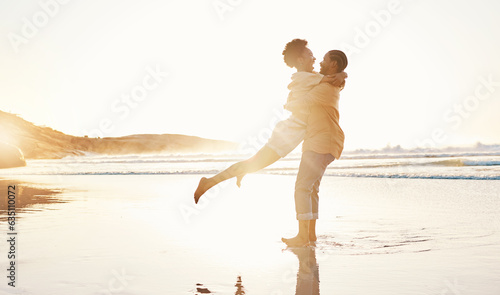 Beach, sunset and happy couple hug, love enjoy quality time together on South Africa vacation, travel or romantic date. Marriage partner, happiness and excited people embrace on anniversary holiday
