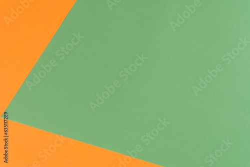 Two colors background, green and orange colors, flat lay, top view