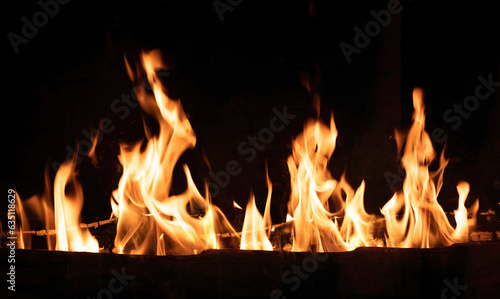 Fireplace close up, fire flame and burning wood log, warm home in winter