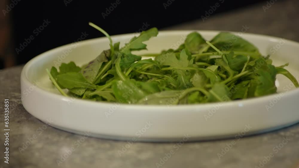 Fresh arugula leaves, top view. Bunch of green fresh arugula . The concept of a healthy lifestyle Fresh arugula leaves, top view. Bunch of green fresh arugula . The concept of a healthy lifestyle