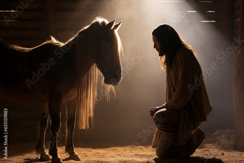 The silhouette of Jesus in a humble stable, resonating with the humility and compassion of his message  photo