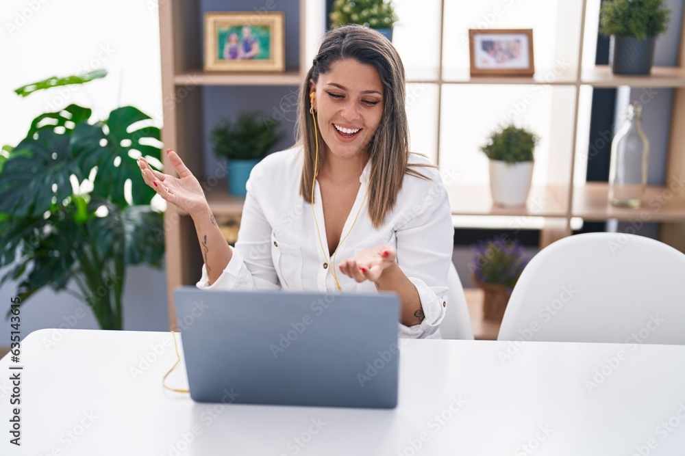Young hispanic woman smiling confident having video call at home Young hispanic woman smiling confident having video call at home