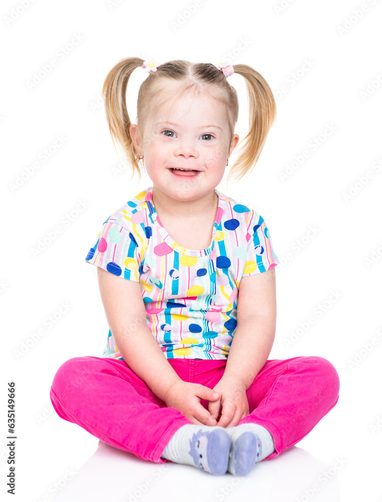 Happy little girl with Downs syndrom looks at camera. Isolated on white background Happy little girl with Downs syndrom looks at camera. Isolated on white background