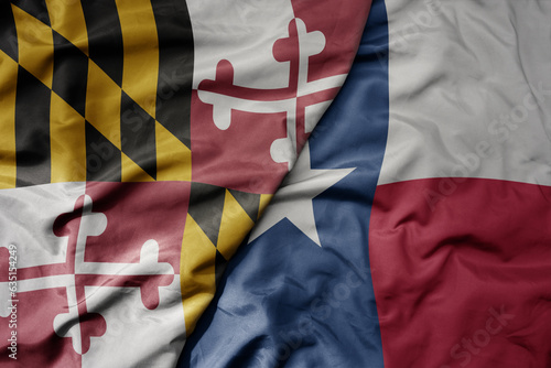 big waving colorful national flag of texas state and flag of maryland state .
