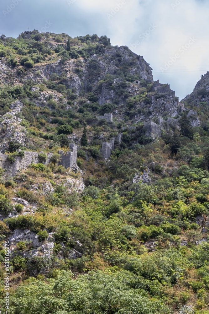 Ancient walls of Kotor on mountains Ancient walls of Kotor on mountains