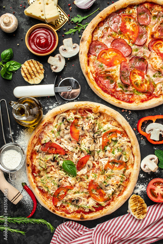 pizza set on a dark background, Fast food lunch, vertical image. top view. place for text