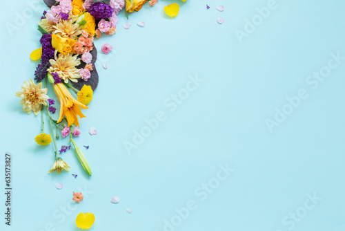  beautiful summer flowers on blue  background